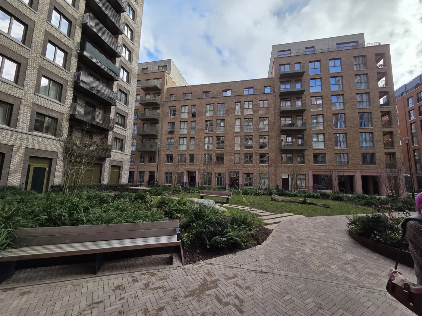 Completed blocks and courtyard planting at Brent Cross Town. The 82 new social rent homes are planned for a different plot, in the Market Quarter