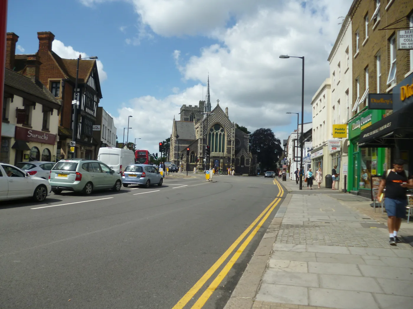 The High Street in High Barnet, with the parish church of St John the Baptist at the top of the hill
