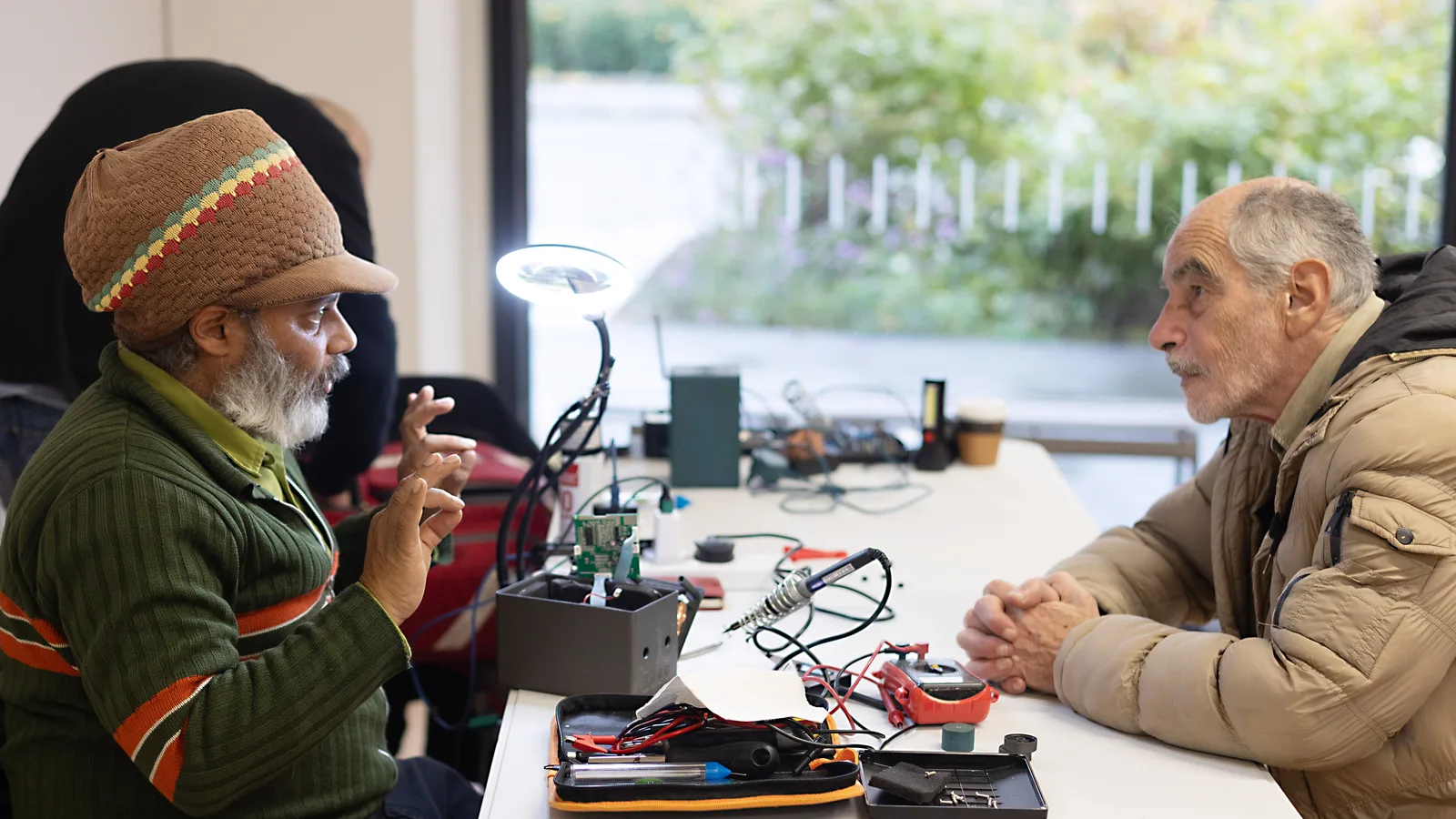 A volunteer repairer and a resident at an earlier Barnet Council Repair Café at Brent Cross Town