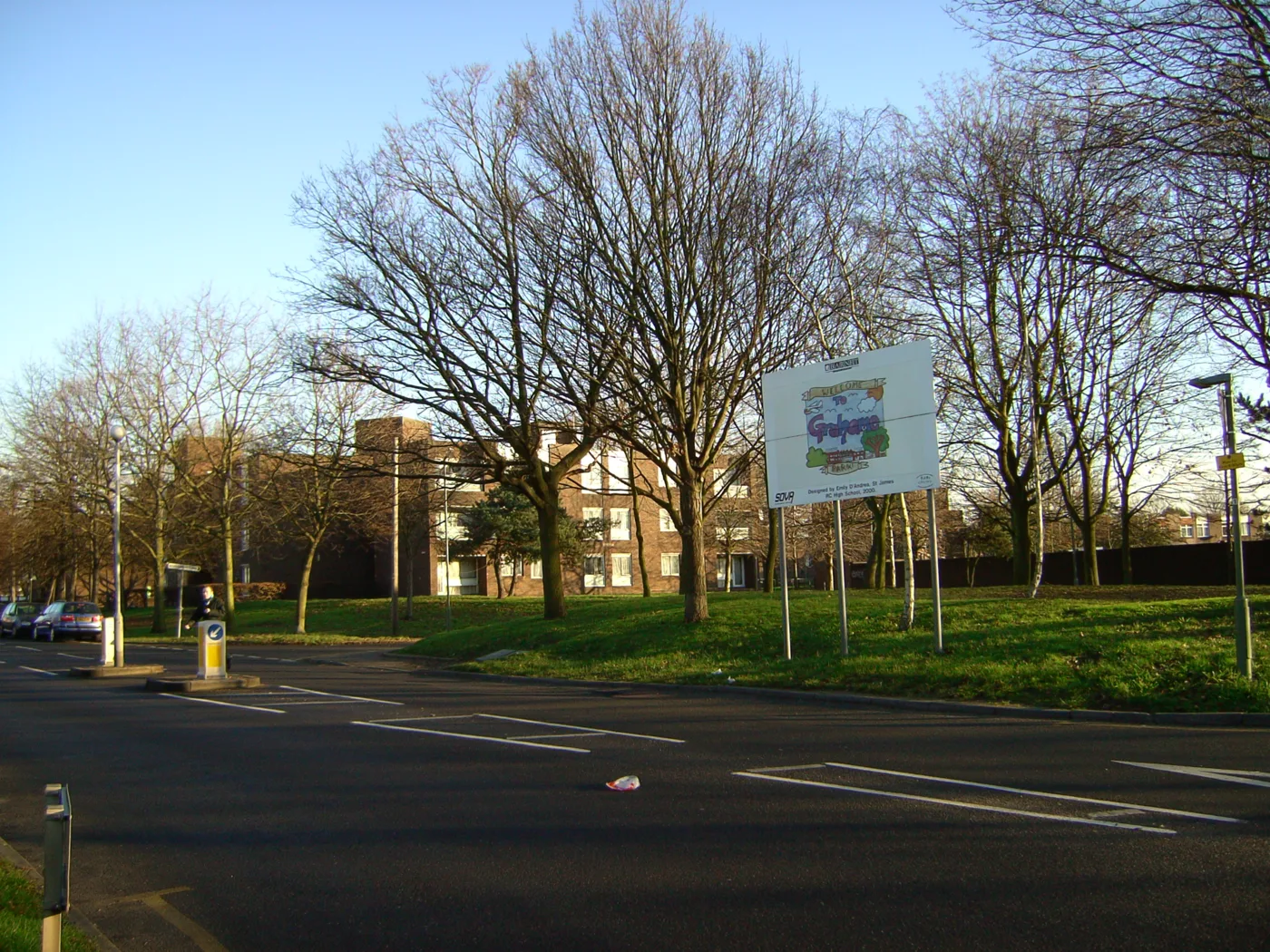 The Grahame Park estate in Colindale, in an earlier photograph of the welcome sign and the original blocks